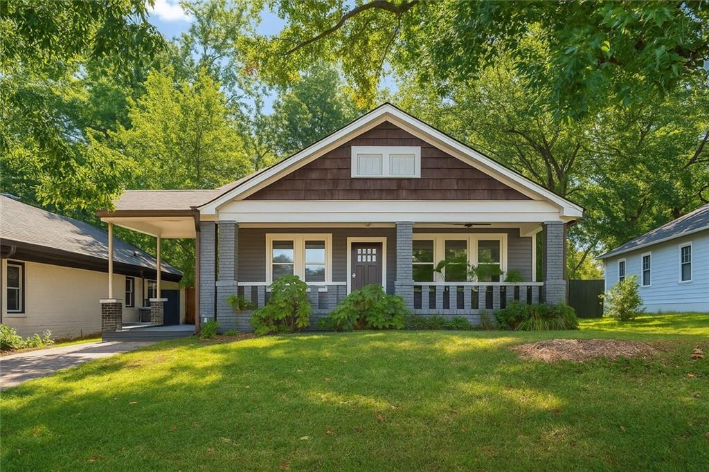 1010 Dill Avenue Southwest Atlanta, GA 30310 - Photo 1 of 39 a front view of a house with a yard