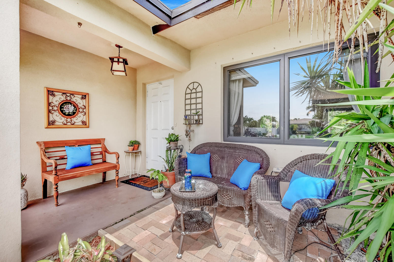 4542 Avalon Street Boca Raton, FL 33428 - Photo 11 of 51 a living room with furniture staircase and a potted plant