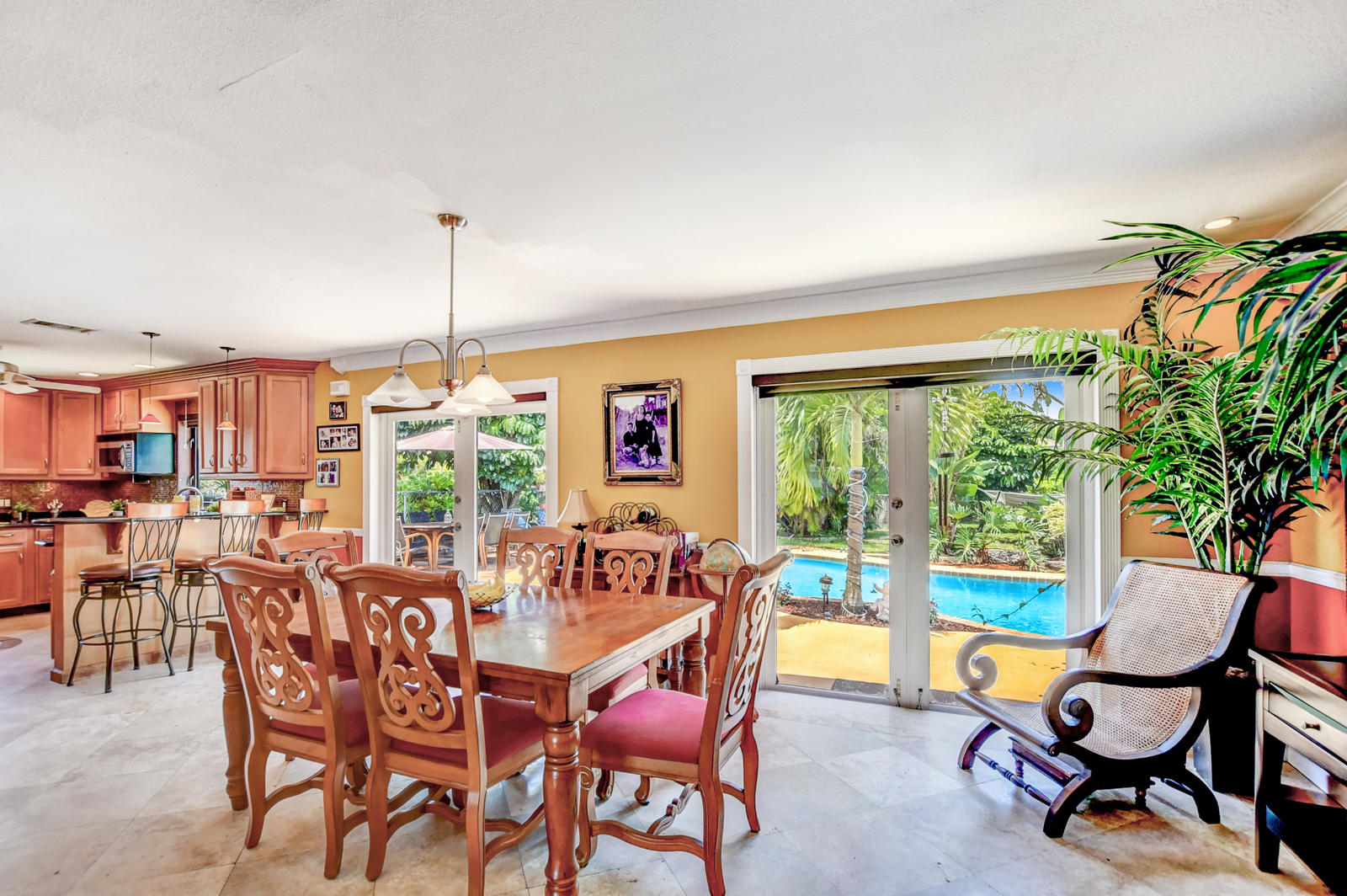 4542 Avalon Street Boca Raton, FL 33428 - Photo 13 of 51 a view of a dining room with furniture window and outside view