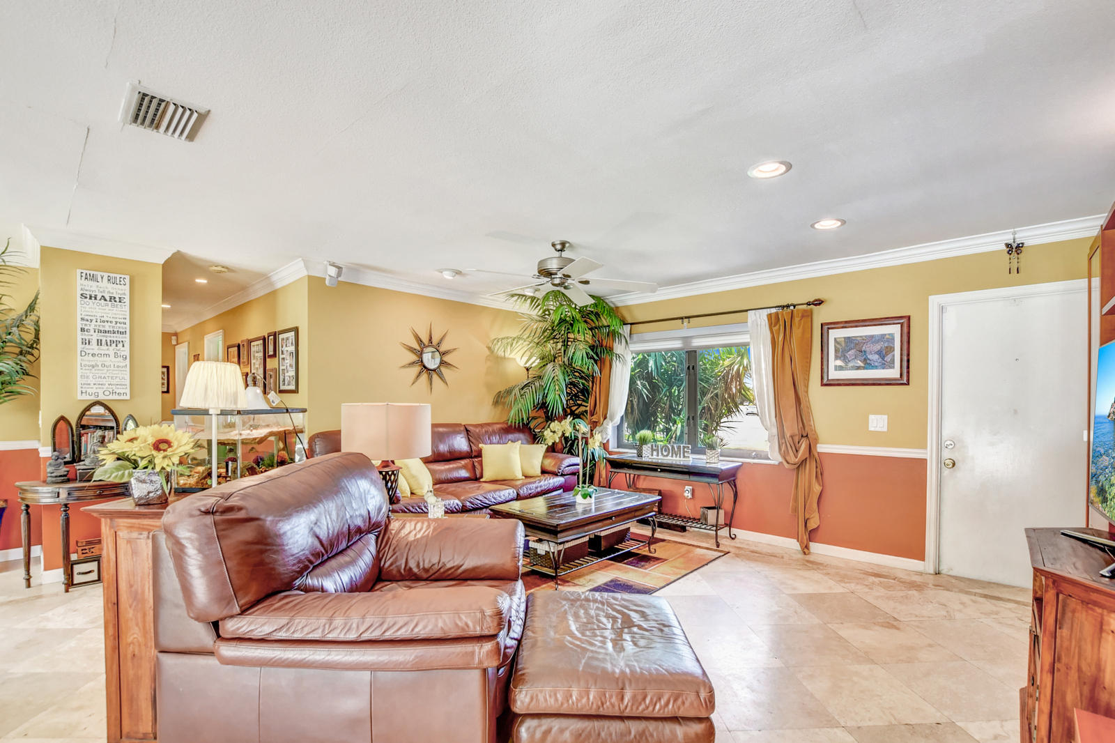 4542 Avalon Street Boca Raton, FL 33428 - Photo 20 of 51 a living room with furniture and a large window
