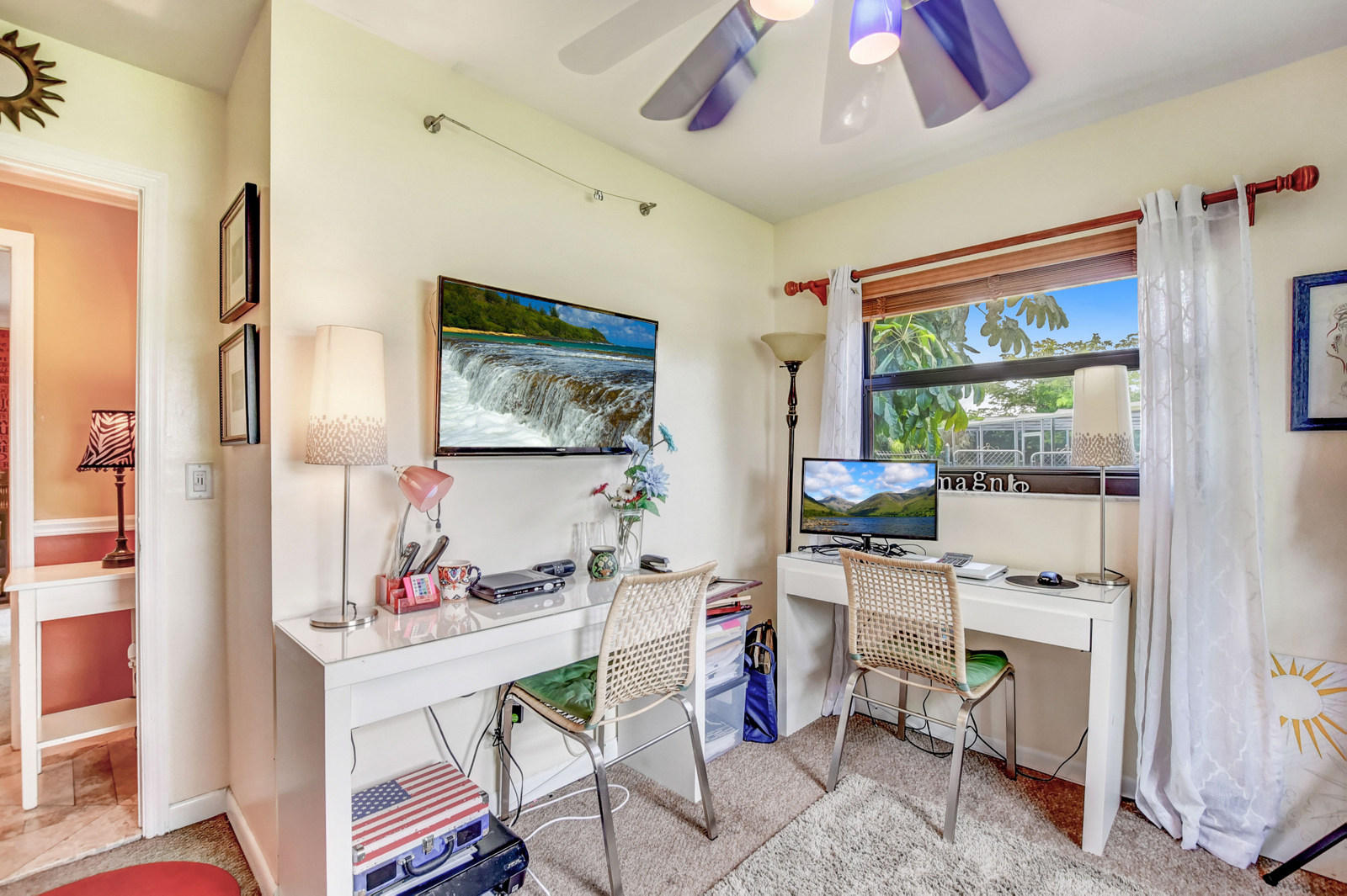 4542 Avalon Street Boca Raton, FL 33428 - Photo 29 of 51 a workspace with furniture and a flat screen tv