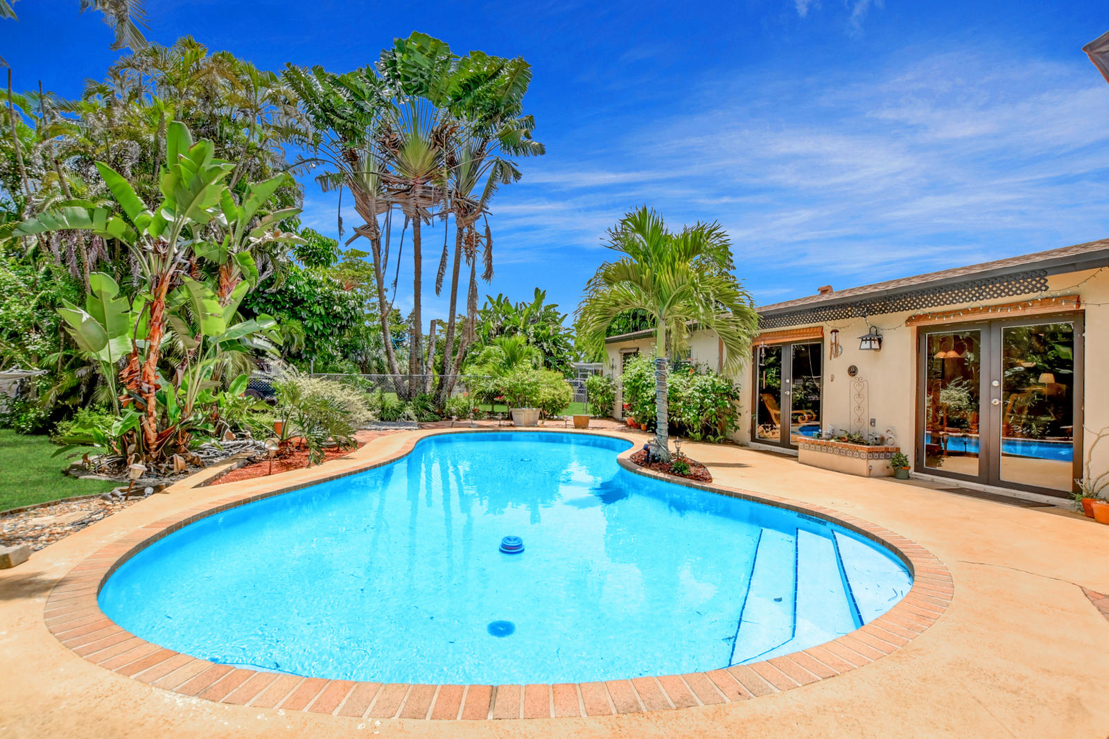 4542 Avalon Street Boca Raton, FL 33428 - Photo 36 of 51 a view of outdoor space yard swimming pool and patio