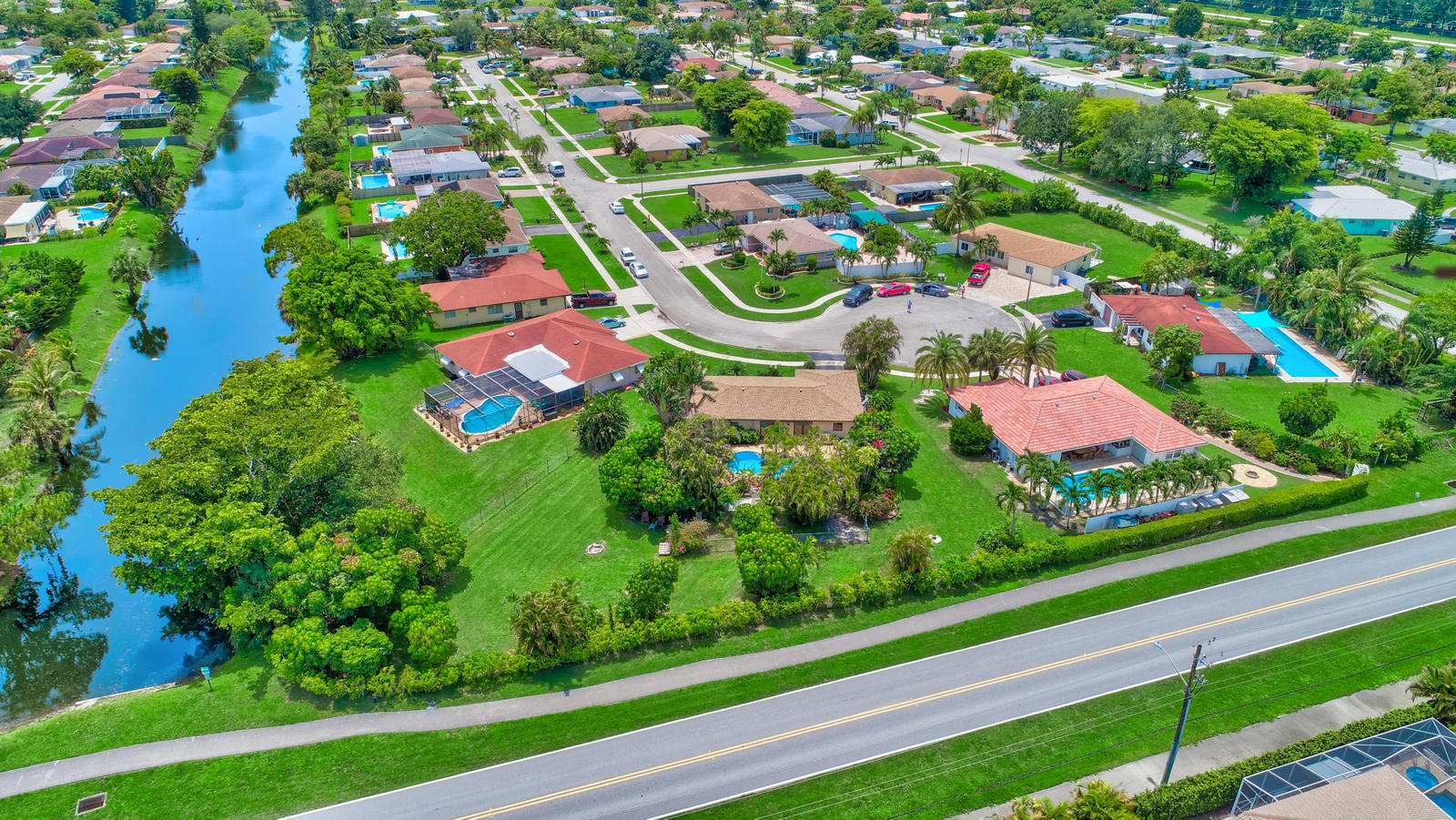4542 Avalon Street Boca Raton, FL 33428 - Photo 44 of 51 a view of yard and swimming pool