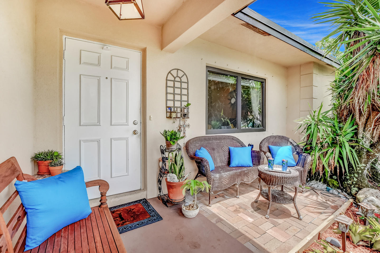 4542 Avalon Street Boca Raton, FL 33428 - Photo 10 of 51 a living room with furniture and a potted plant