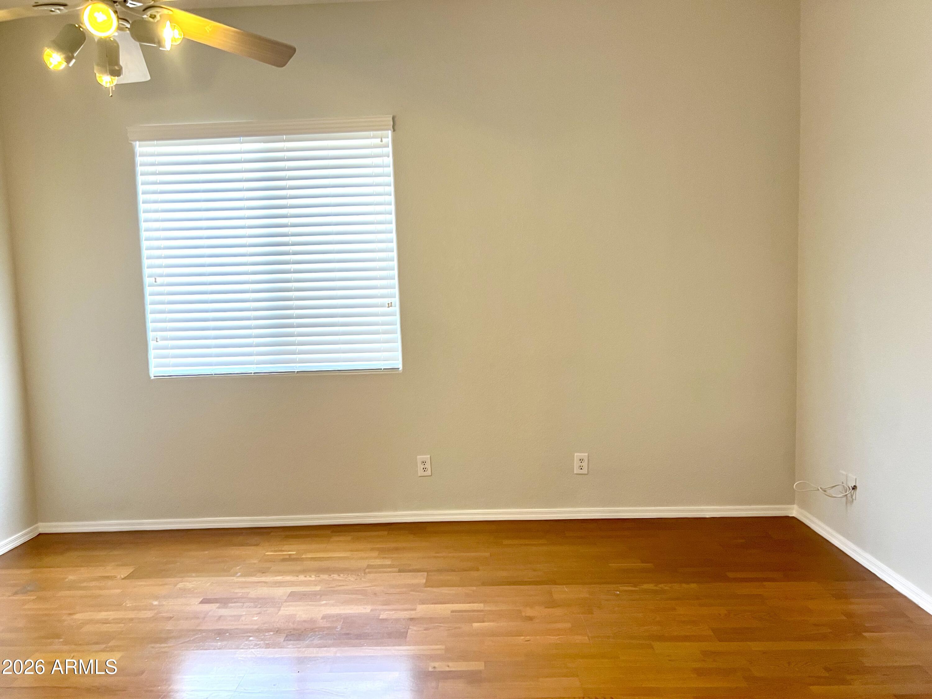 407 West Helena Drive Phoenix, AZ 85023 - Photo 14 of 35 a view of a room with an empty space and a window