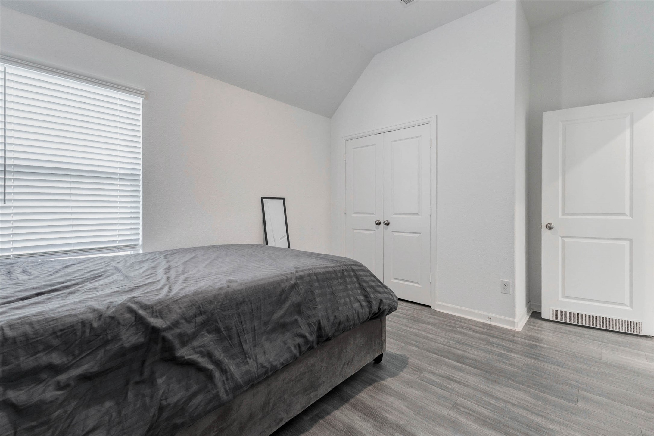 3711 Castle Rock Drive Rosenberg, TX 77469 - Photo 39 of 46 a bedroom with a bed and wooden floor