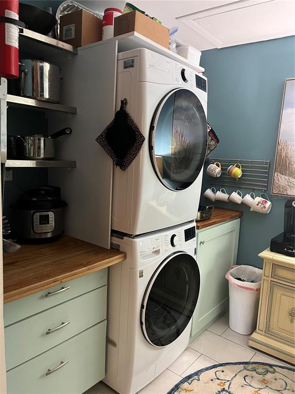 4154 66th St Circle West, Unit 4154 Bradenton, FL 34209 - Photo 8 of 28 a view of a storage and utility room with washer and dryer