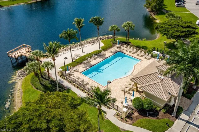 a view of a house with a flower garden