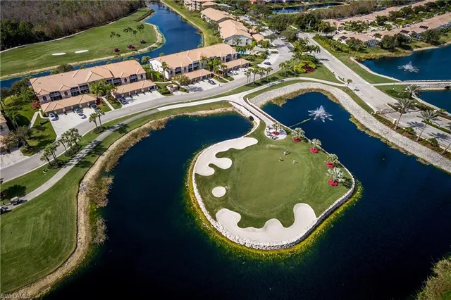 an aerial view of a house a swimming pool and outdoor space