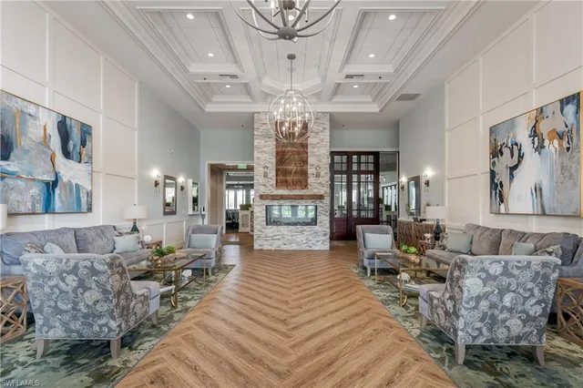 a very nice looking living room with furniture and a large window