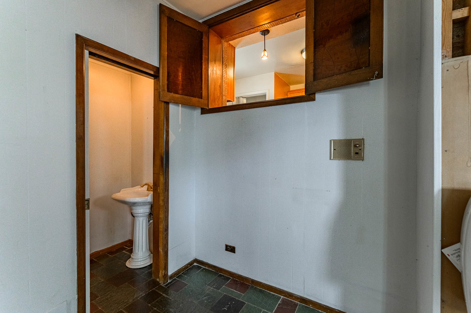 2834 West 85th Place Chicago, IL 60652 - Photo 13 of 17 a bathroom with a sink and a mirror