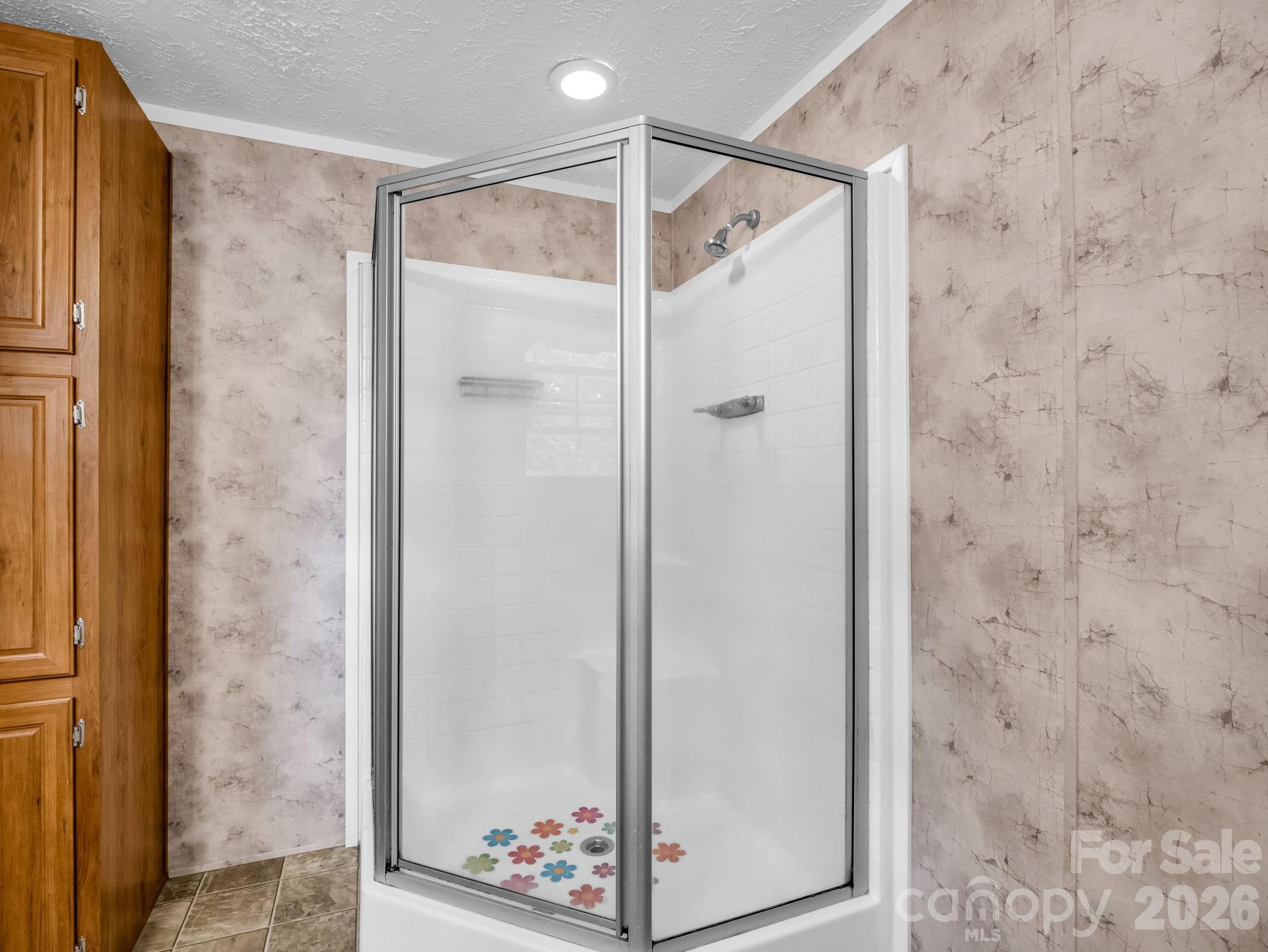 1449 Toney Road Bostic, NC 28018 - Photo 32 of 43 a bathroom with a glass shower door