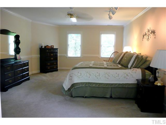 5116 Salem Ridge Road Holly Springs, NC 27540 - Photo 14 of 25 This spacious master retreat is finished with crown molding and chair rail. There is a sitting area that is perfect for relaxing or reading your favorite book. Master Bedroom