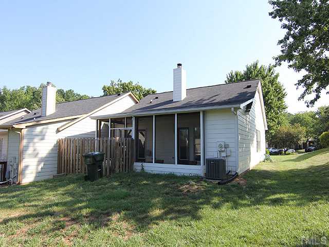 2611 Cottage Circle Raleigh, NC 27613 - Photo 15 of 15 a view of a house with a yard and plants