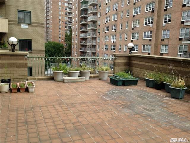 42-31 Colden Street, Unit F3E/3G Queens, NY 11355 - Photo 9 of 9 a bench is sitting in middle of a building