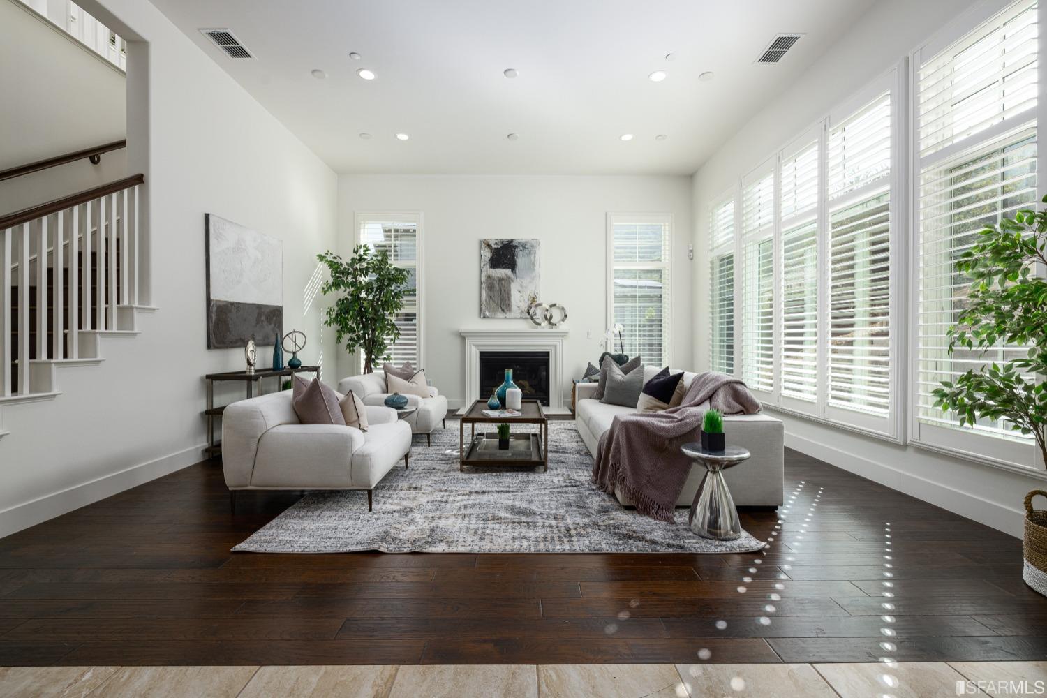 30 Wilder Road Orinda, CA 94563 - Photo 15 of 57 a living room with furniture a fireplace and a large window