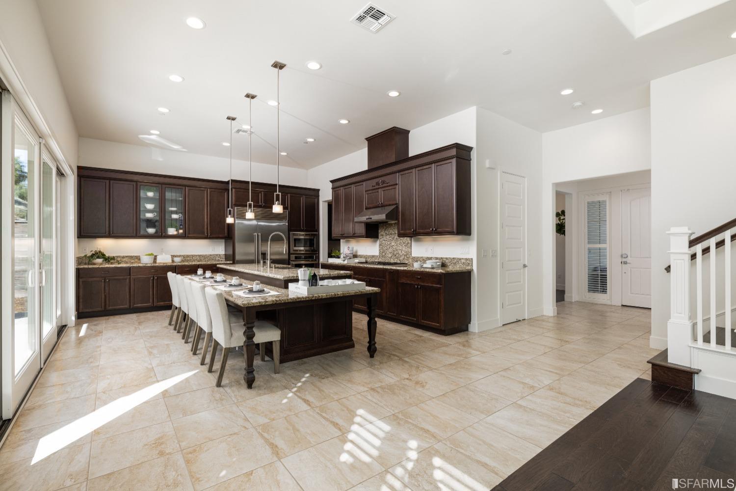 30 Wilder Road Orinda, CA 94563 - Photo 20 of 57 a kitchen with a sink refrigerator and cabinets