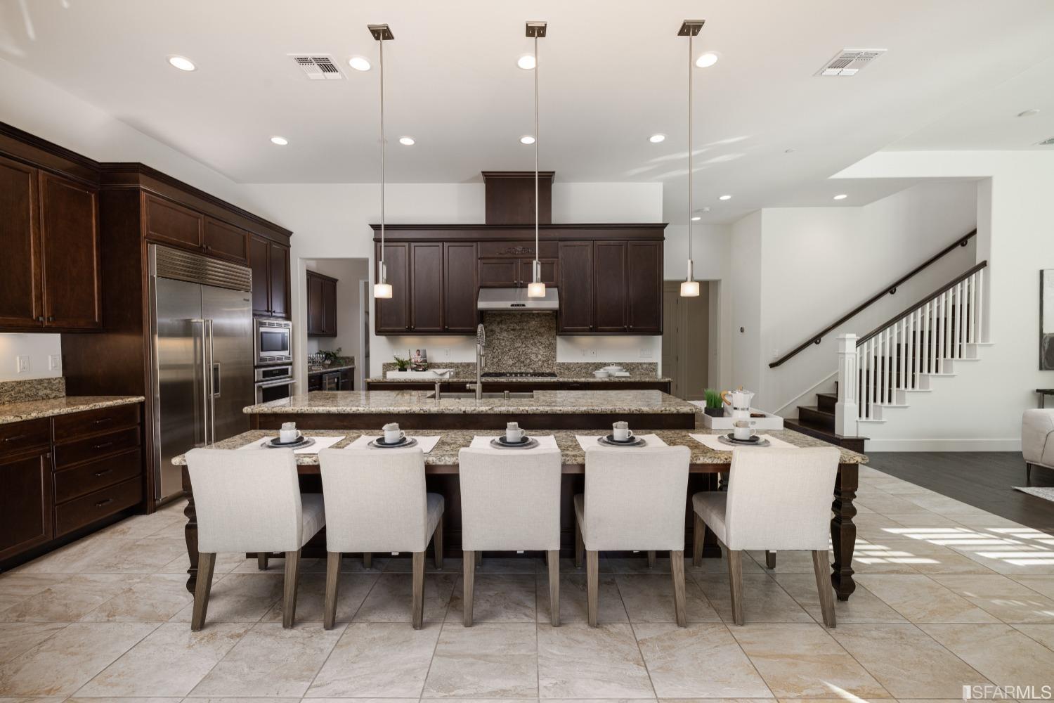 30 Wilder Road Orinda, CA 94563 - Photo 23 of 57 a kitchen with appliances cabinets and chair