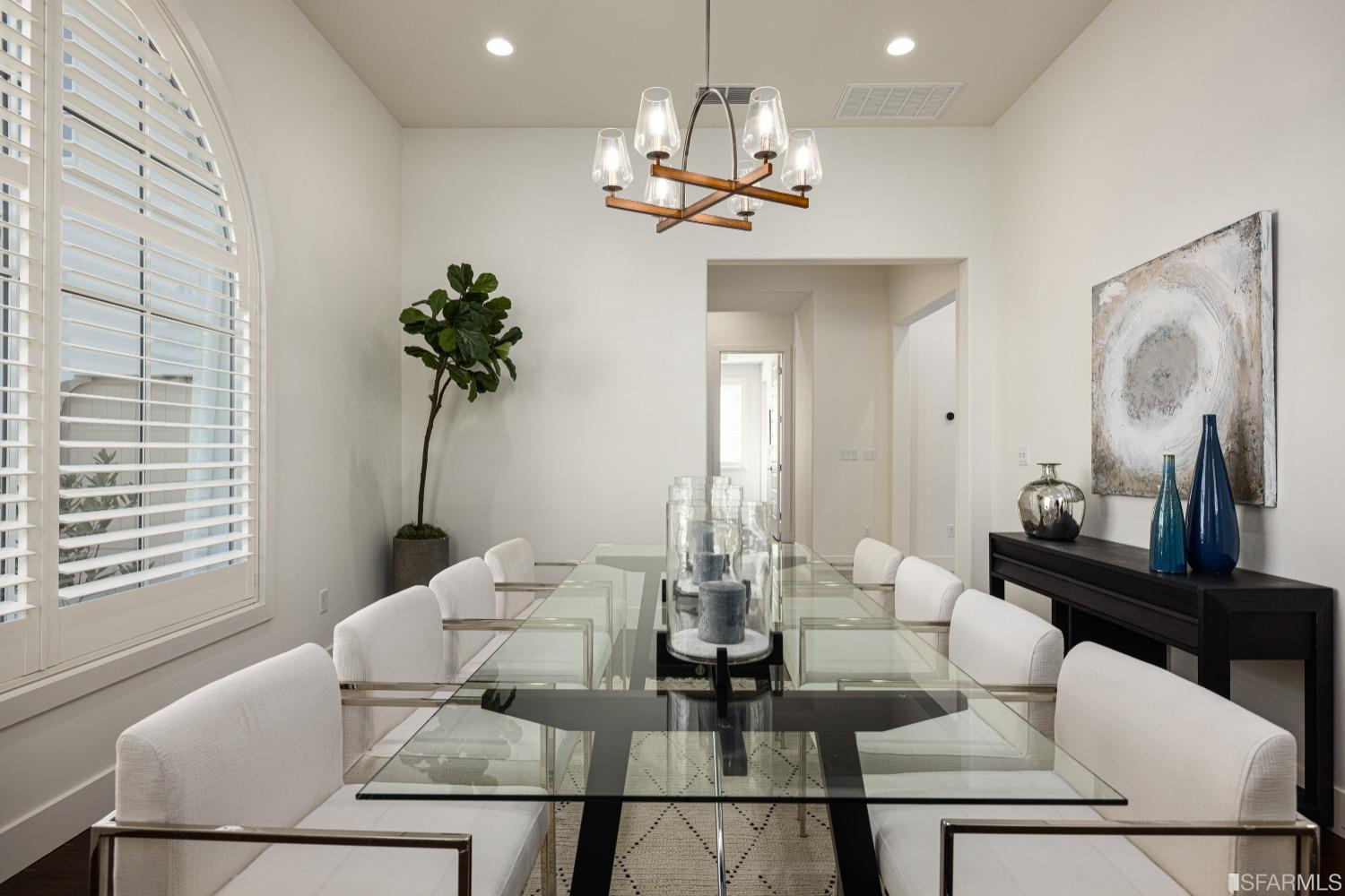 30 Wilder Road Orinda, CA 94563 - Photo 8 of 57 a dining room with furniture and a chandelier