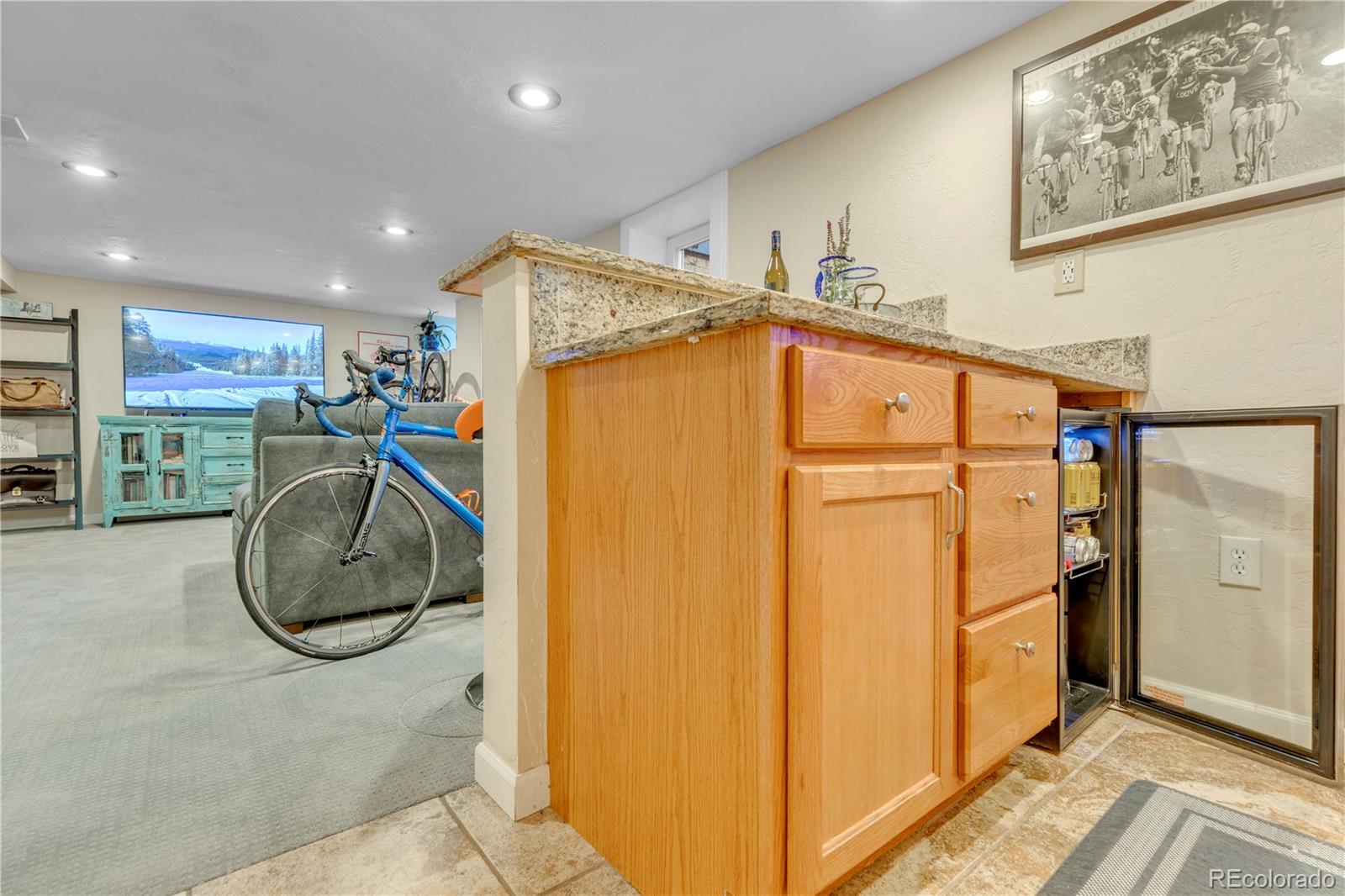 2651 Adams Street Denver, CO 80205 - Photo 23 of 37 a view of a storage & utility room with washer and dryer