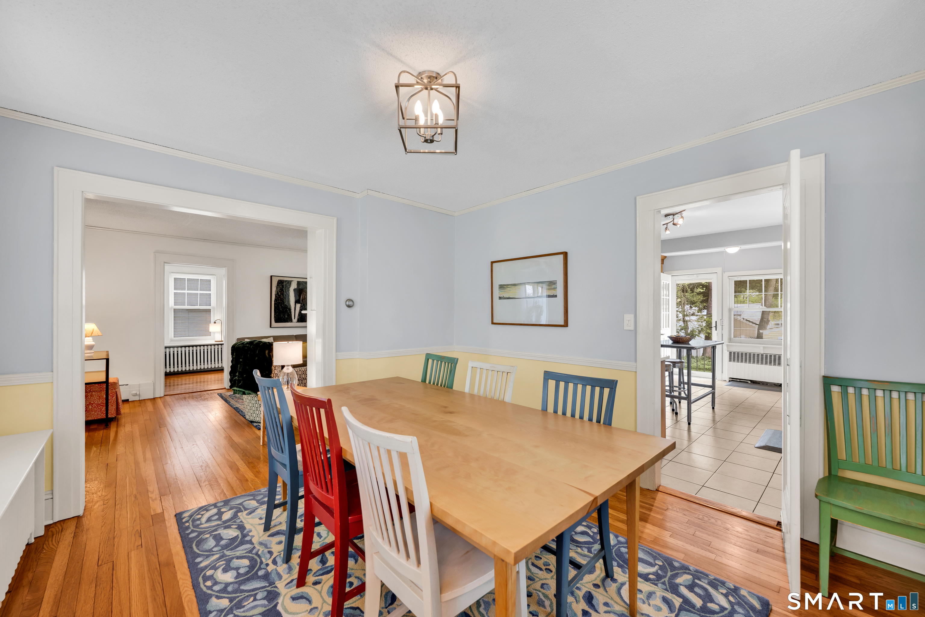 44 Beverly Road Wethersfield, CT 06109 - Photo 13 of 31 a living room with furniture a dining table and a piano table