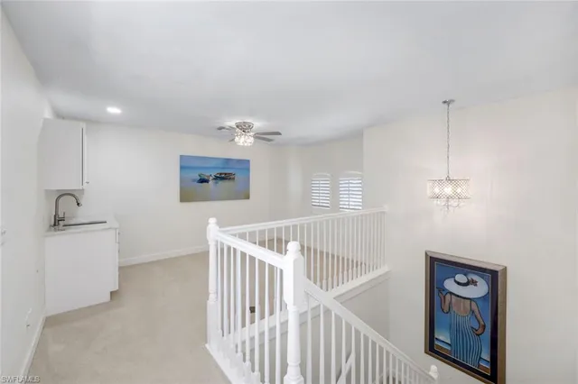 a view of a hallway with workspace