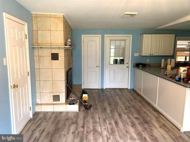 2165 Herblew Road Warrington, PA 18976 - Photo 10 of 24 Kitchen, fireplace, back door entrance