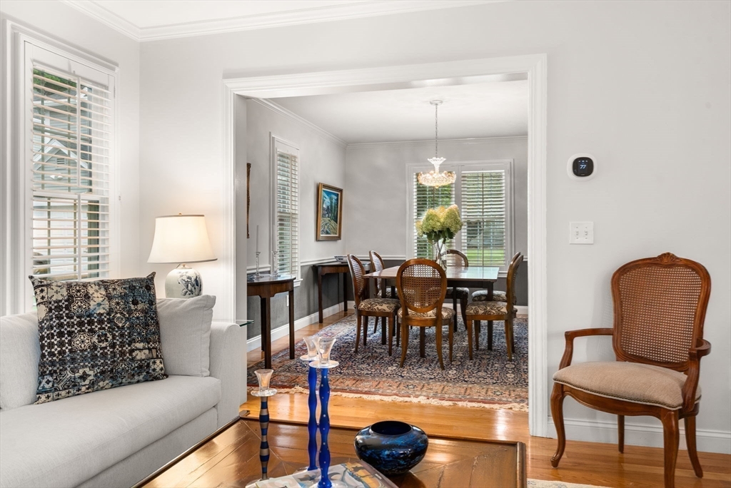 5 Upham Way, Unit 5 Weston, MA 02493 - Photo 14 of 29 a living room with furniture and a large window