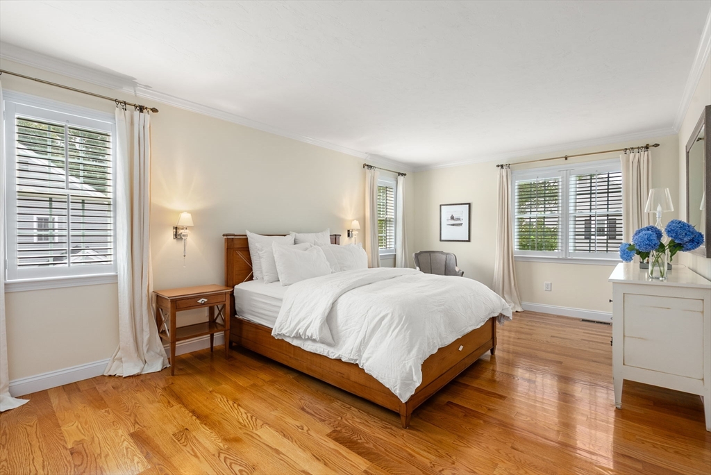 5 Upham Way, Unit 5 Weston, MA 02493 - Photo 17 of 29 a bedroom with a bed and window