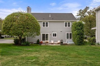 5 Upham Way, Unit 5 Weston, MA 02493 - Photo 27 of 29 a front view of house with garden