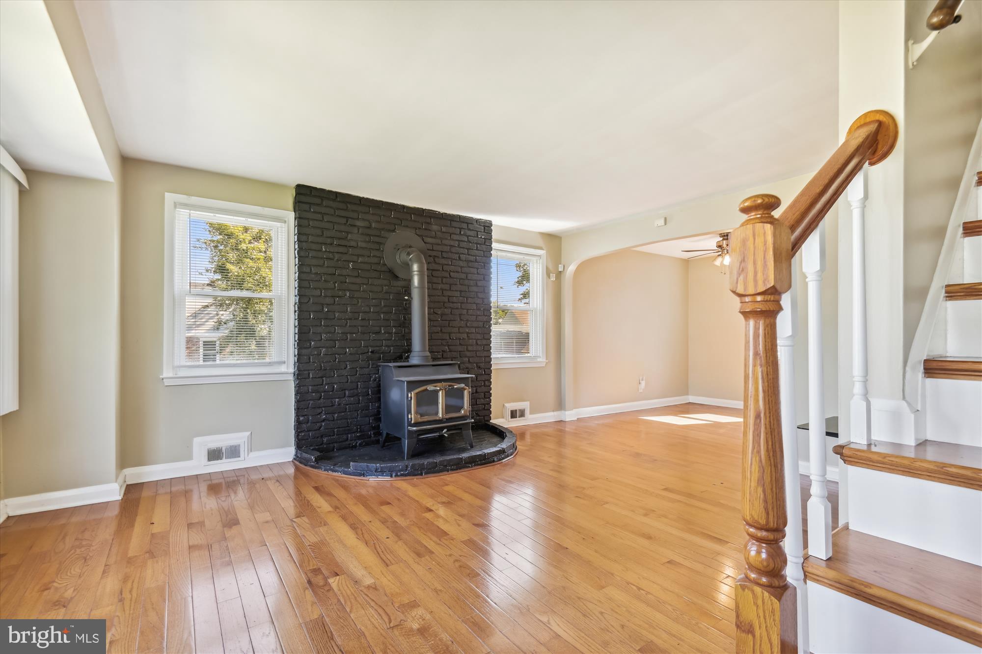 3415 Mayfair Road Gwynn Oak, MD 21207 - Photo 17 of 35 a view of empty room with wooden floor and fan