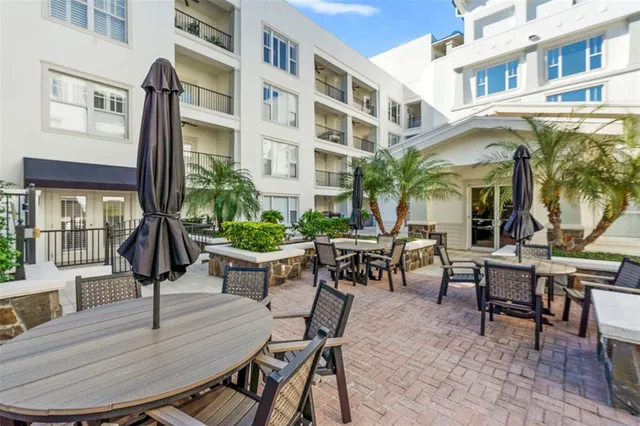 a view of a building with sitting area