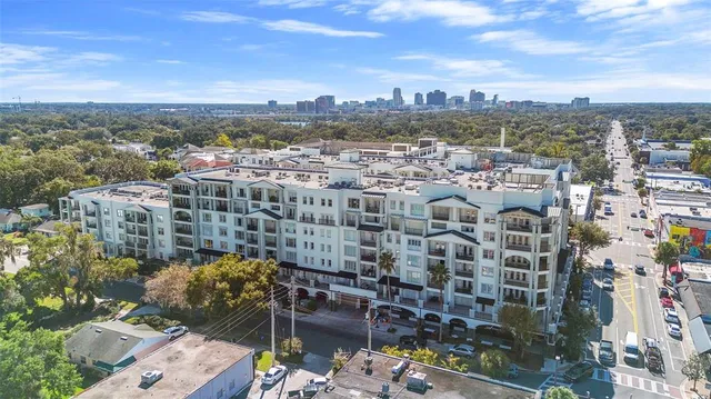 a room with gym equipment and a large window