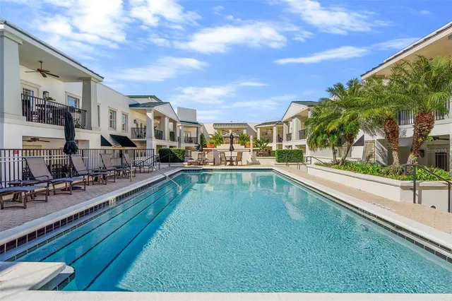 a view of a building with sitting area