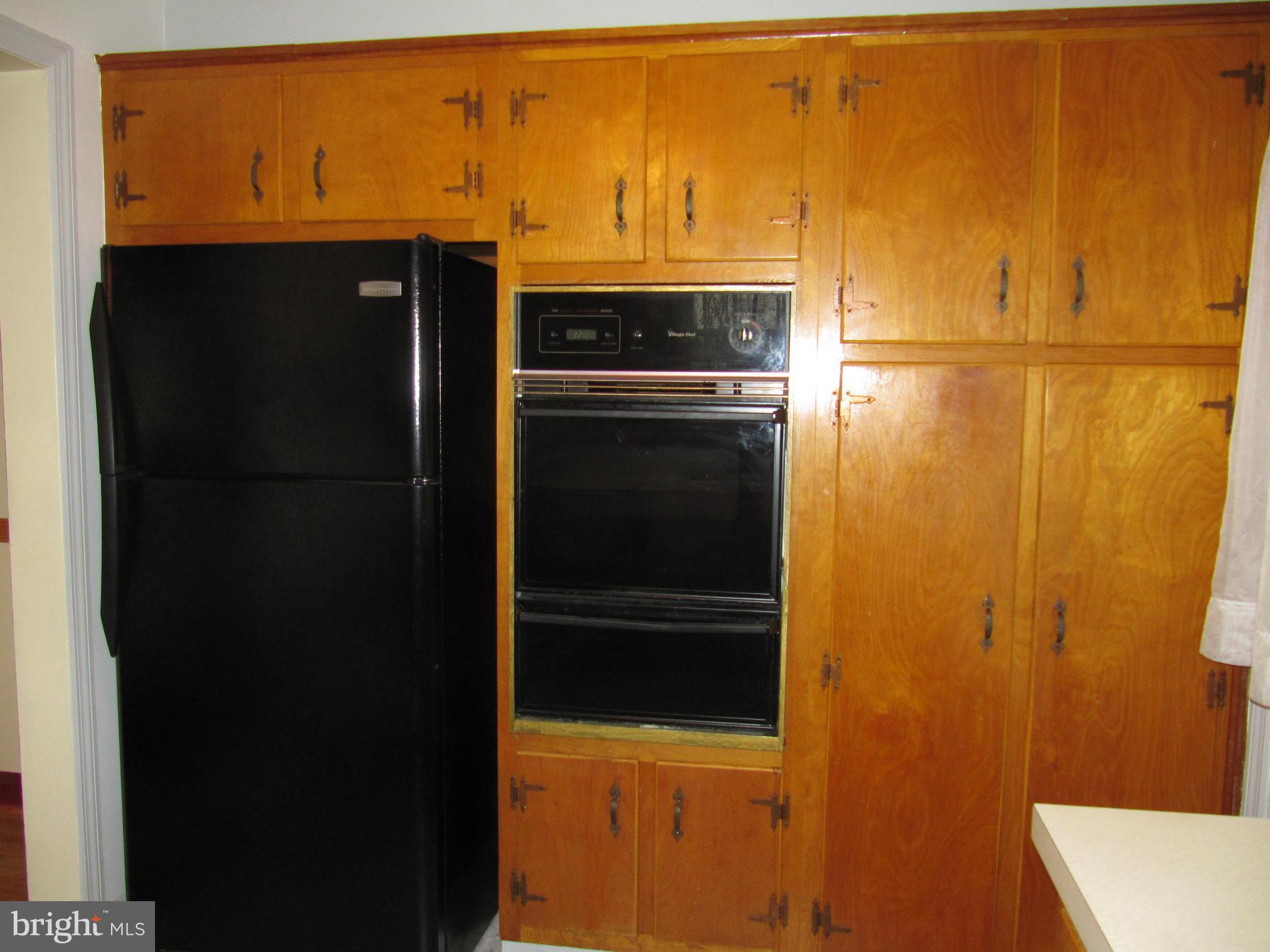 7518 Windsor Mill Road Baltimore, MD 21244 - Photo 5 of 17 a close view of a refrigerator in the kitchen