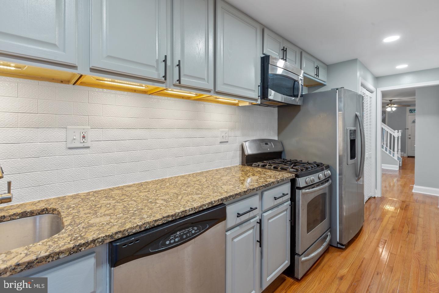 225 14th Place Northeast Washington, DC 20002 - Photo 8 of 20 Modern kitchen with sleek finishes.