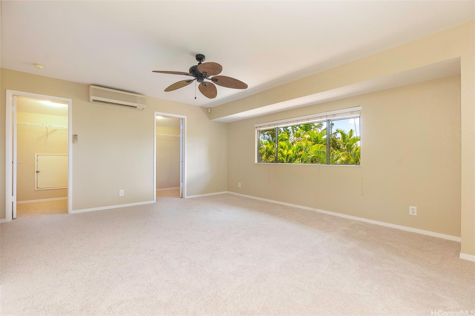 92-247 Opuakii Place Kapolei, HI 96707 - Photo 17 of 25 an empty room with windows and ceiling fan view