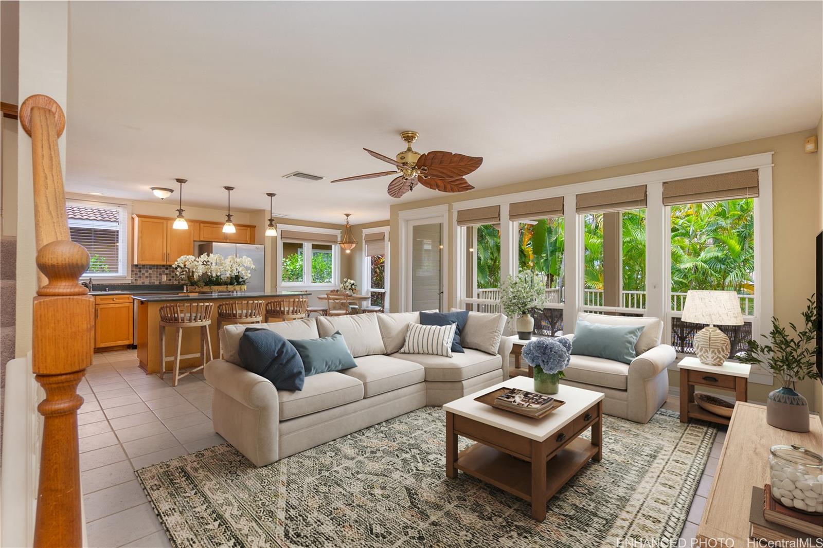 92-247 Opuakii Place Kapolei, HI 96707 - Photo 2 of 25 a living room with furniture and a large window