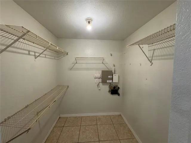 a view of a room with racks on the wall