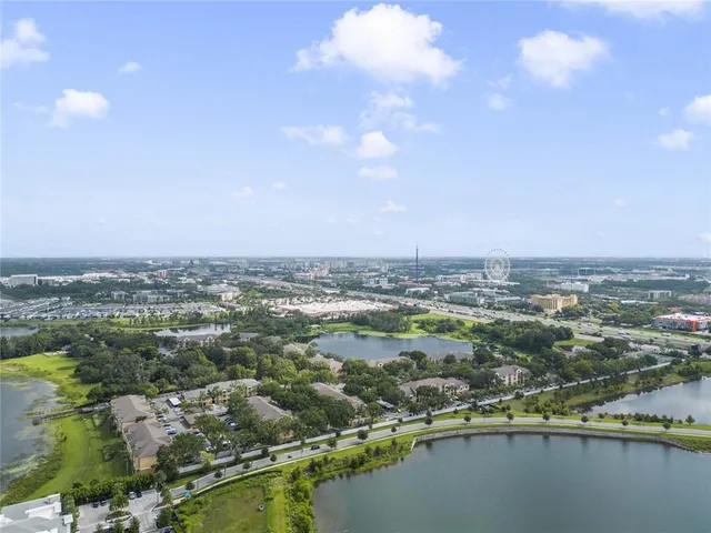 an aerial view of residential building and lake view