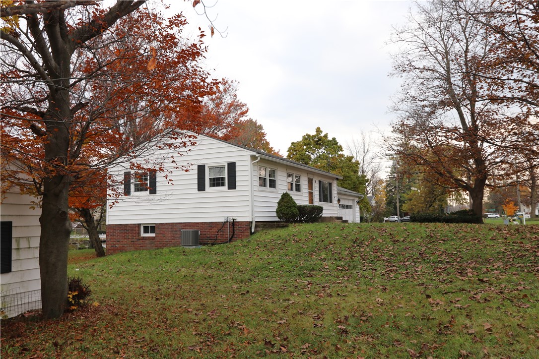 91 Pulsifer Drive Auburn, NY 13021 - Photo 7 of 27 Side View of Home