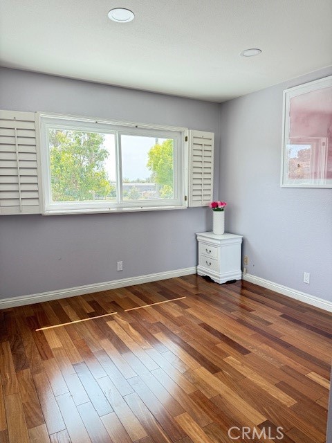 24 Carver Irvine, CA 92620 - Photo 12 of 18 a view of a room with wooden floor and window