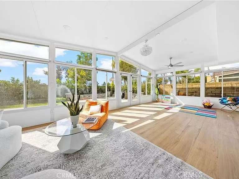 24 Carver Irvine, CA 92620 - Photo 8 of 18 a living room with furniture and a large window