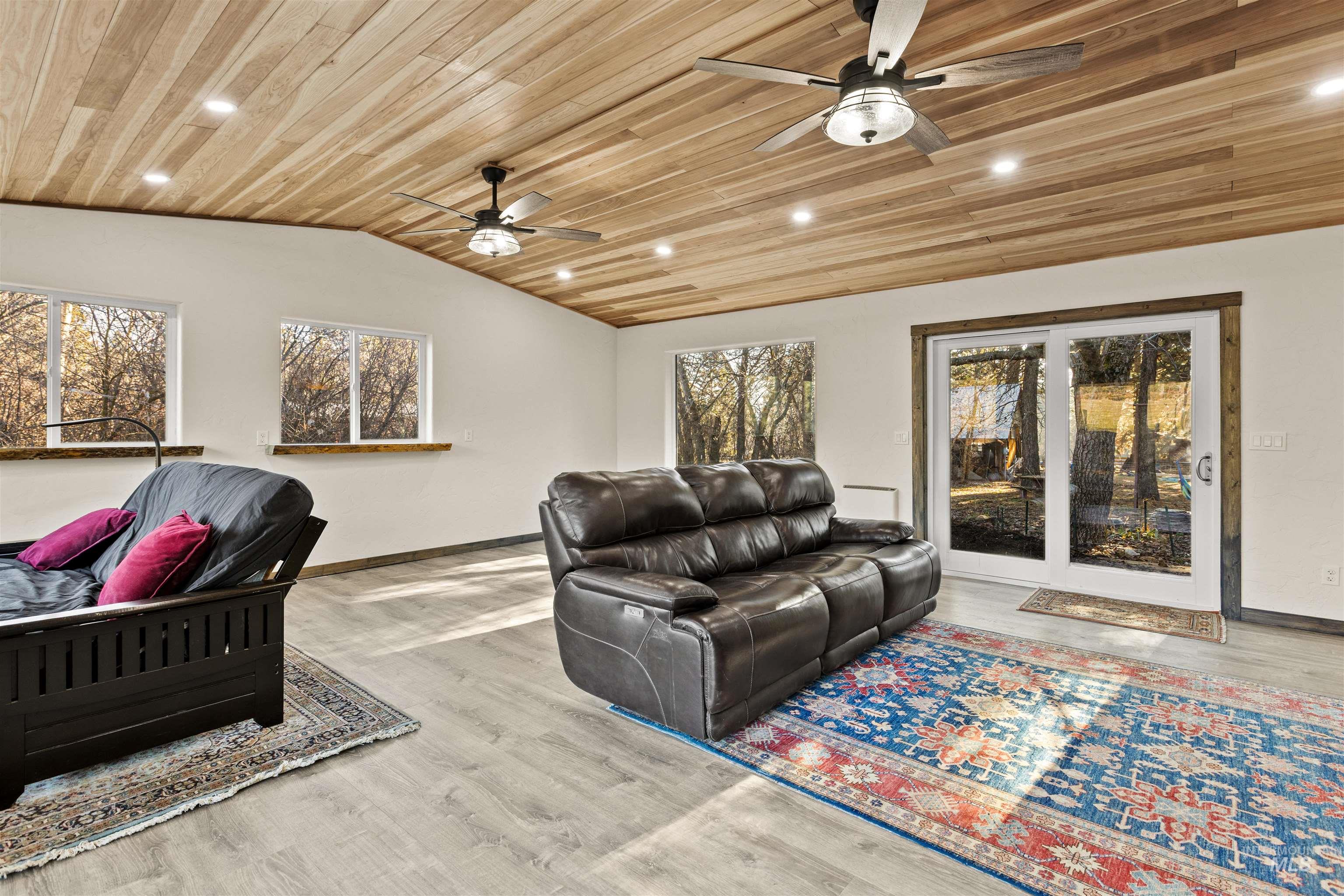 3488 Ward Road Cambridge, ID 83610 - Photo 11 of 49 Sunroom featuring wooden ceiling, lofted ceiling, recessed lighting, and light wood-style floors