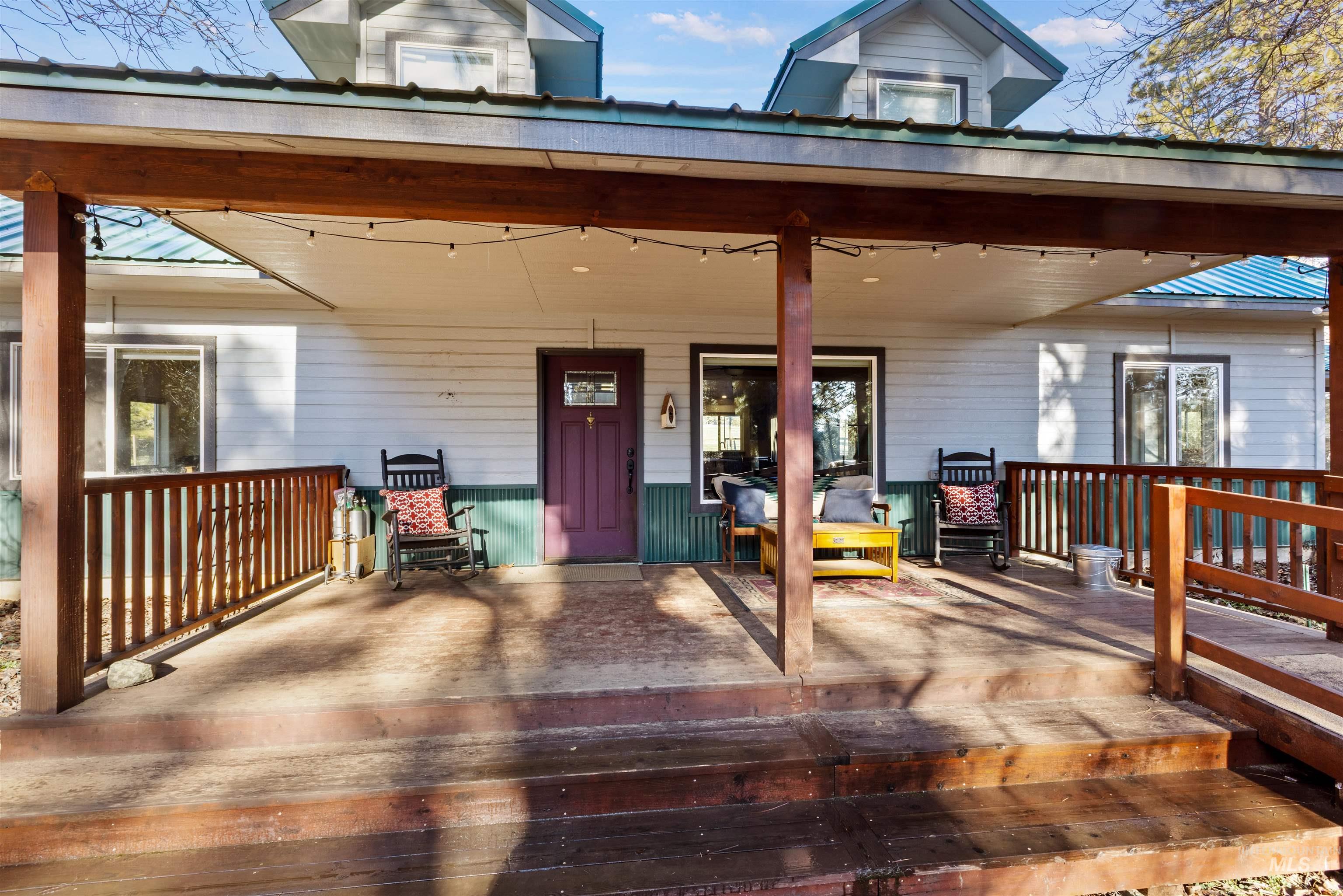 3488 Ward Road Cambridge, ID 83610 - Photo 2 of 49 Entrance to property with a metal roof and covered porch