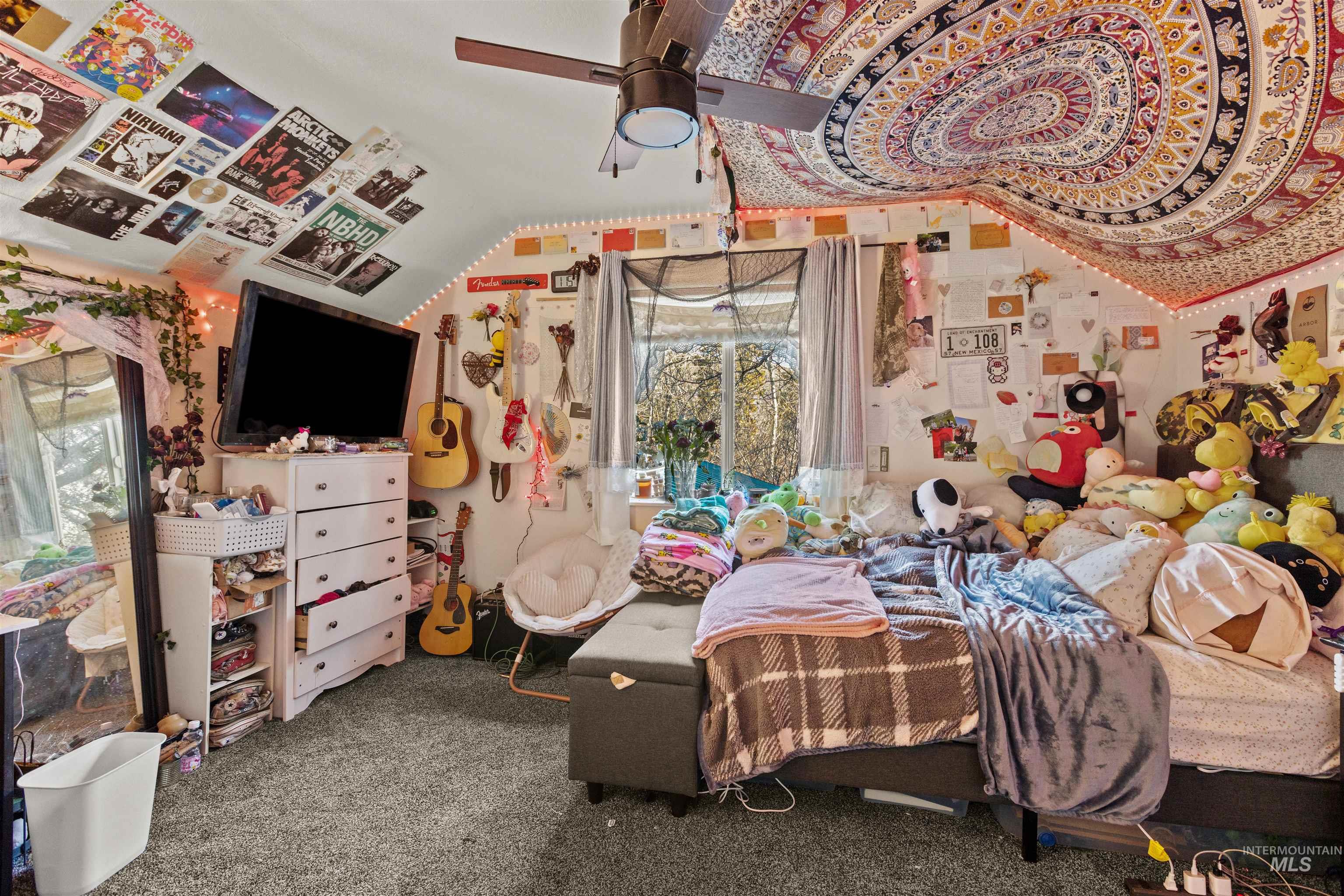 3488 Ward Road Cambridge, ID 83610 - Photo 33 of 49 Carpeted bedroom with vaulted ceiling and a ceiling fan