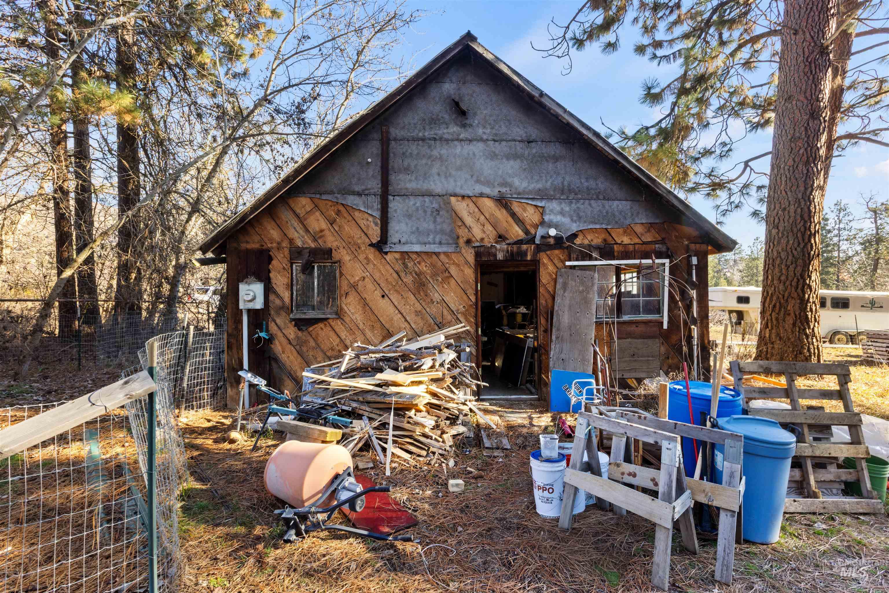 3488 Ward Road Cambridge, ID 83610 - Photo 39 of 49 Rear view of property featuring an outbuilding