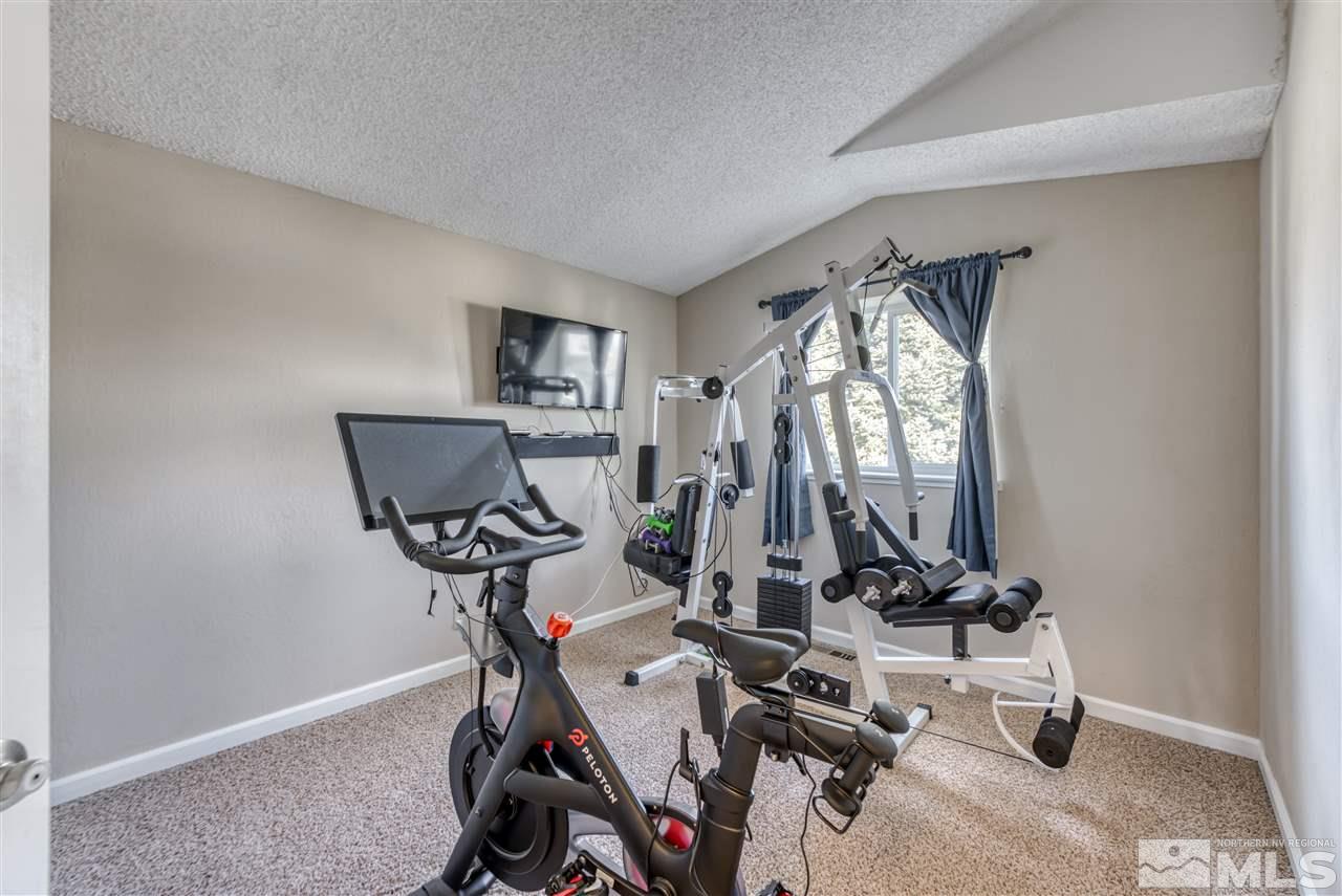 6282 Chesterfield Lane Reno, NV 89523 - Photo 23 of 34 a view of a room with gym equipment