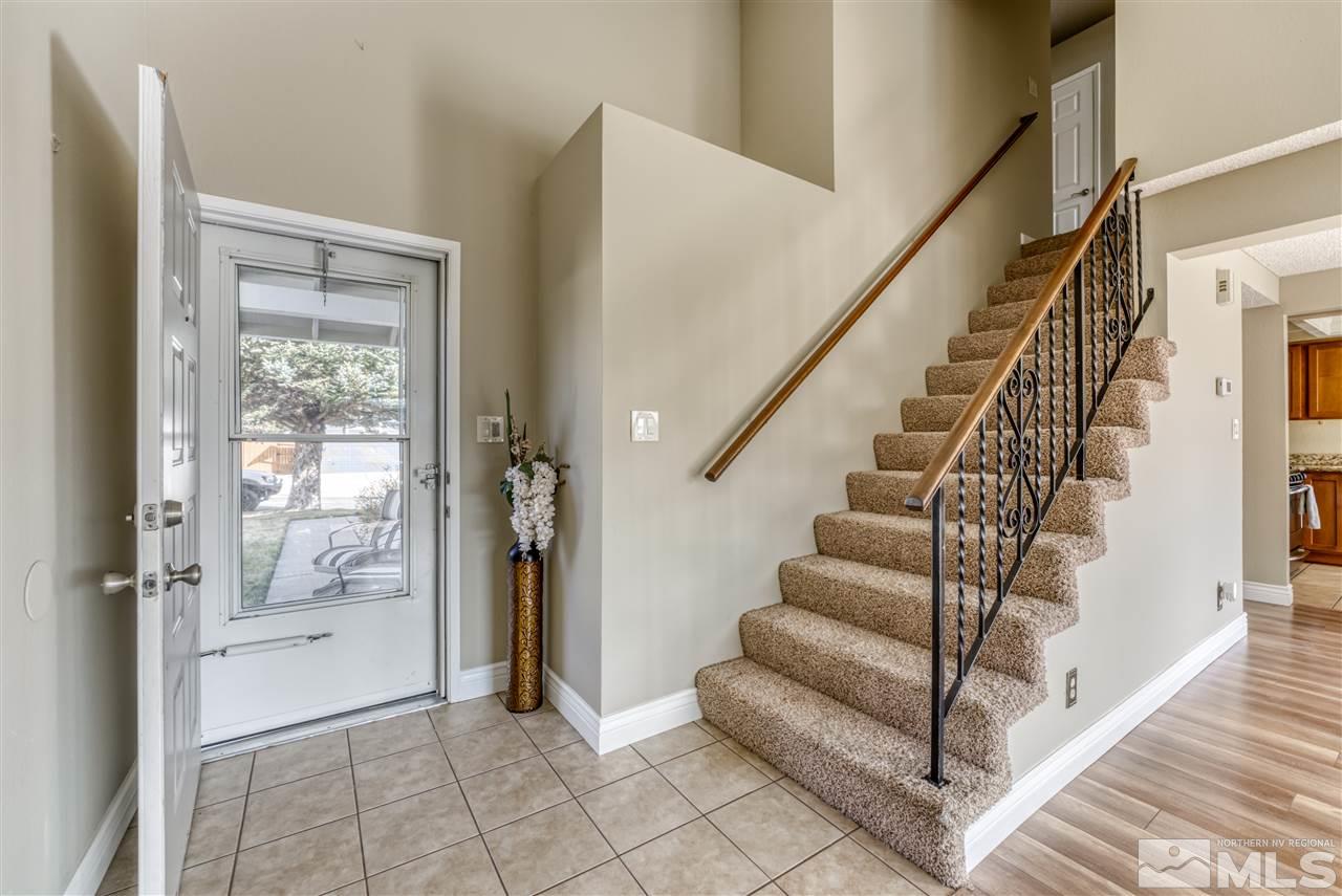 6282 Chesterfield Lane Reno, NV 89523 - Photo 3 of 34 a view of entryway and hall with wooden floor