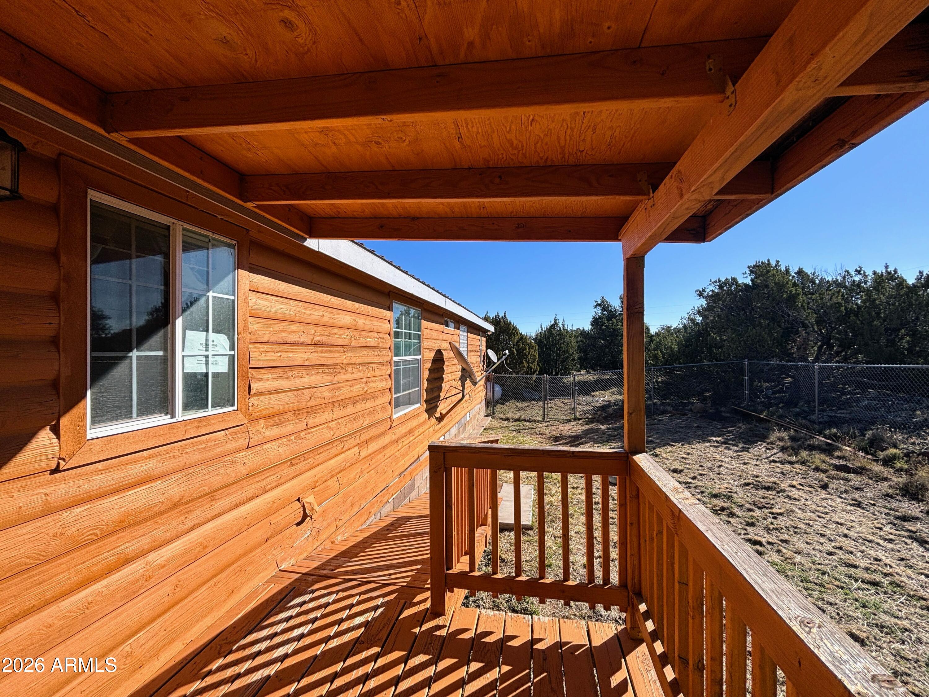 111 County Road, Unit 8015 Show Low, AZ 85901 - Photo 18 of 34 a view of balcony with wooden floor